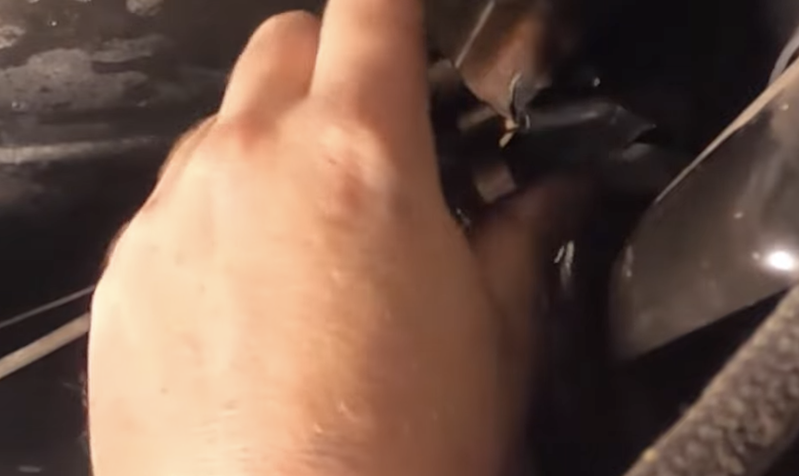 Threading the Six Shooter onto the cable to dial in pedal feel by hand