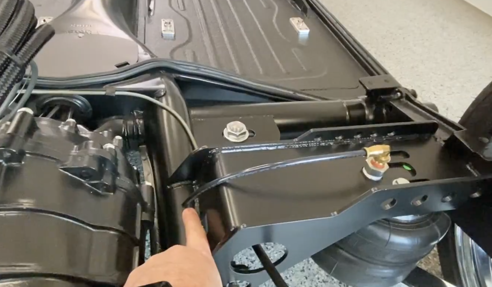 Air lines connected, soap-testing for leaks under pressure