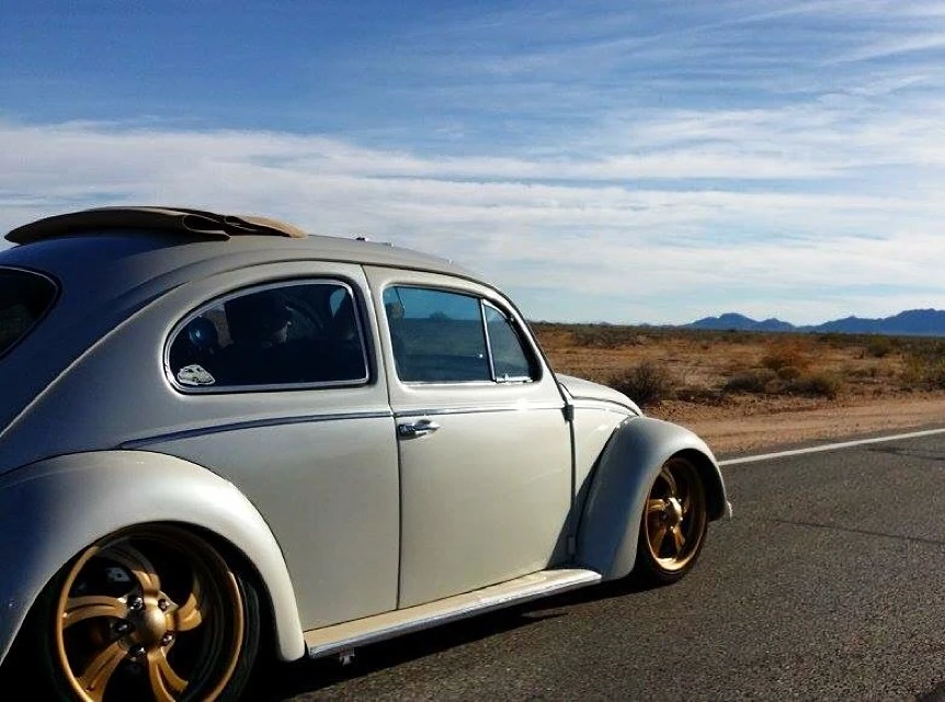classic VW Beetle on the open road with Airkewld suspension