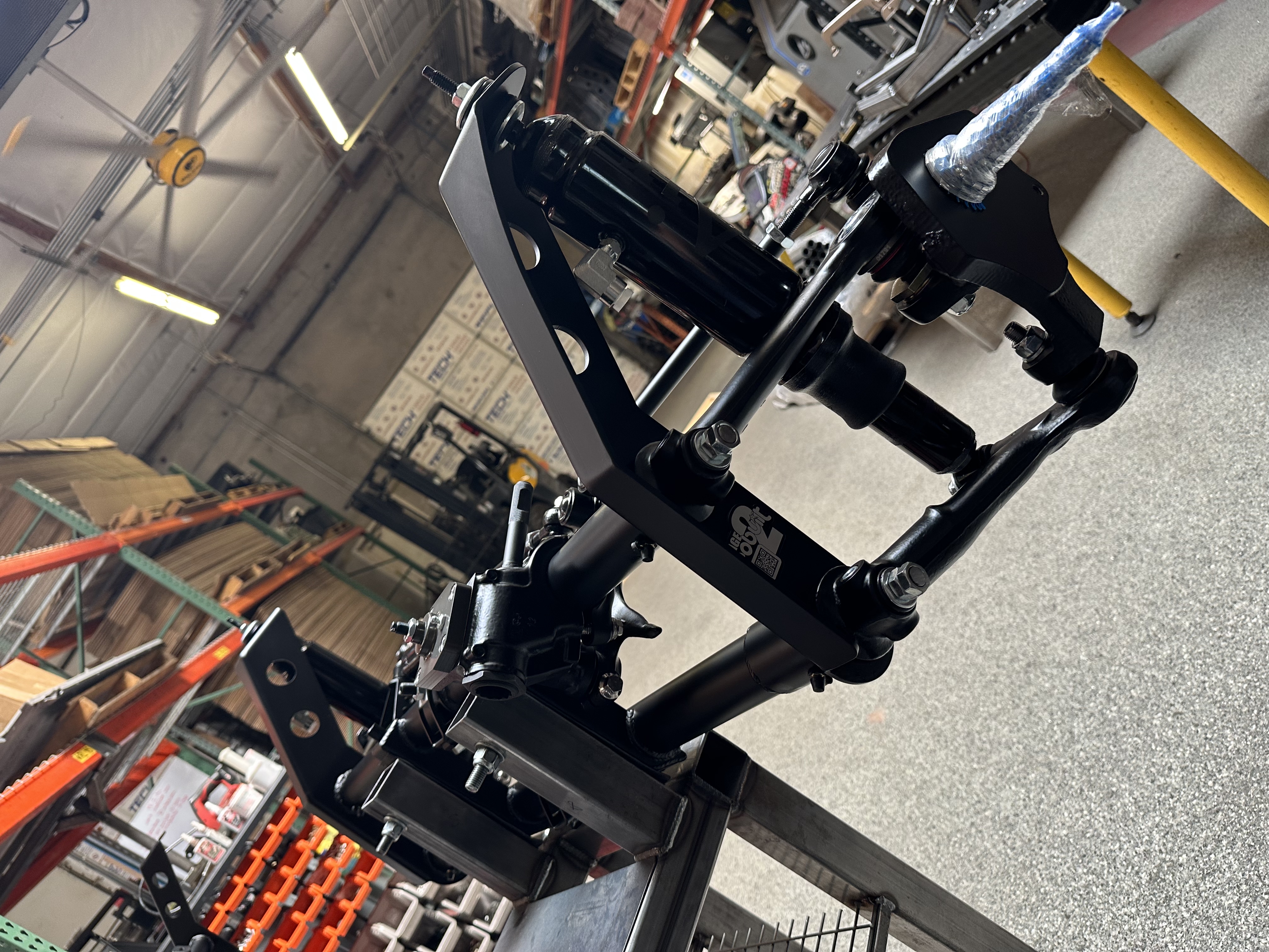 Close-up of the air sleeve shock installed on a ball joint front beam
