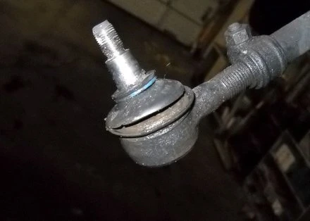 worn VW tie rod end with torn boot