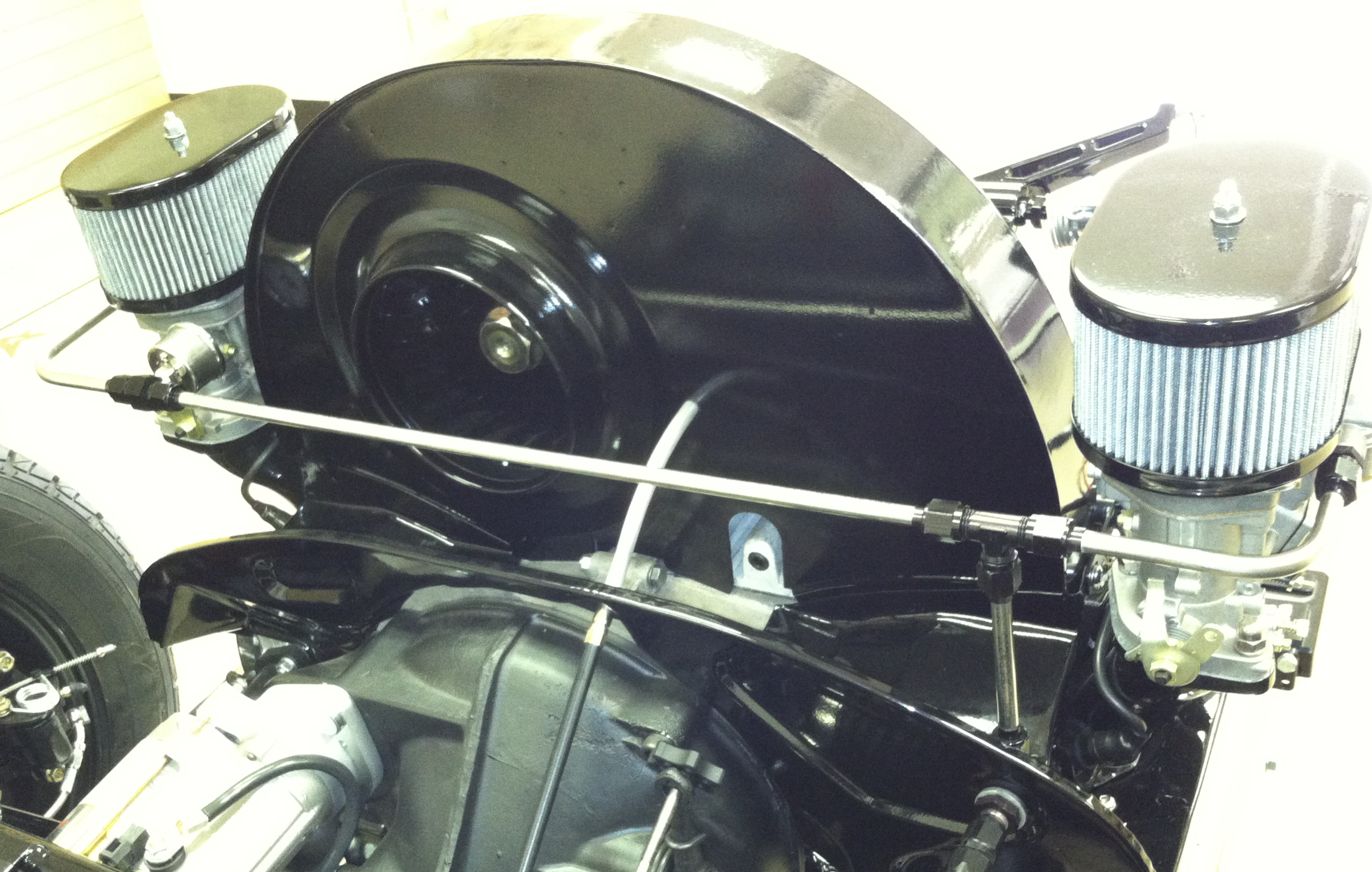 Final leak check with finger under each fitting on the engine bay hardline kit