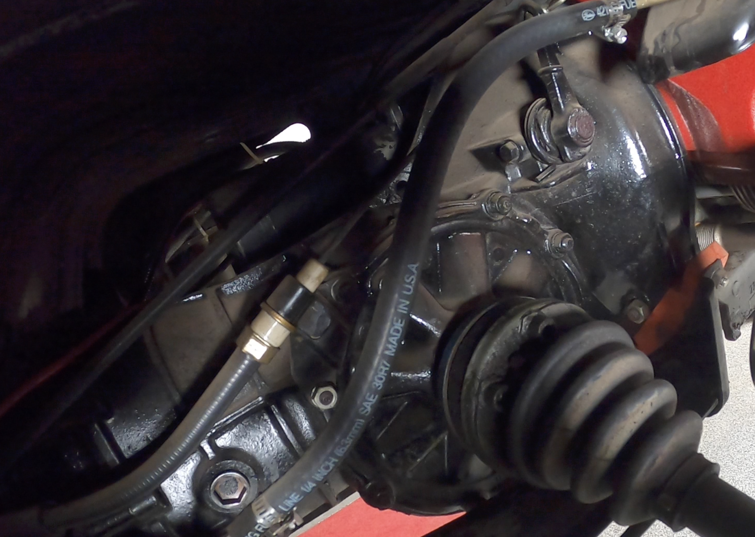Disconnecting the rear soft line at the transaxle hardline