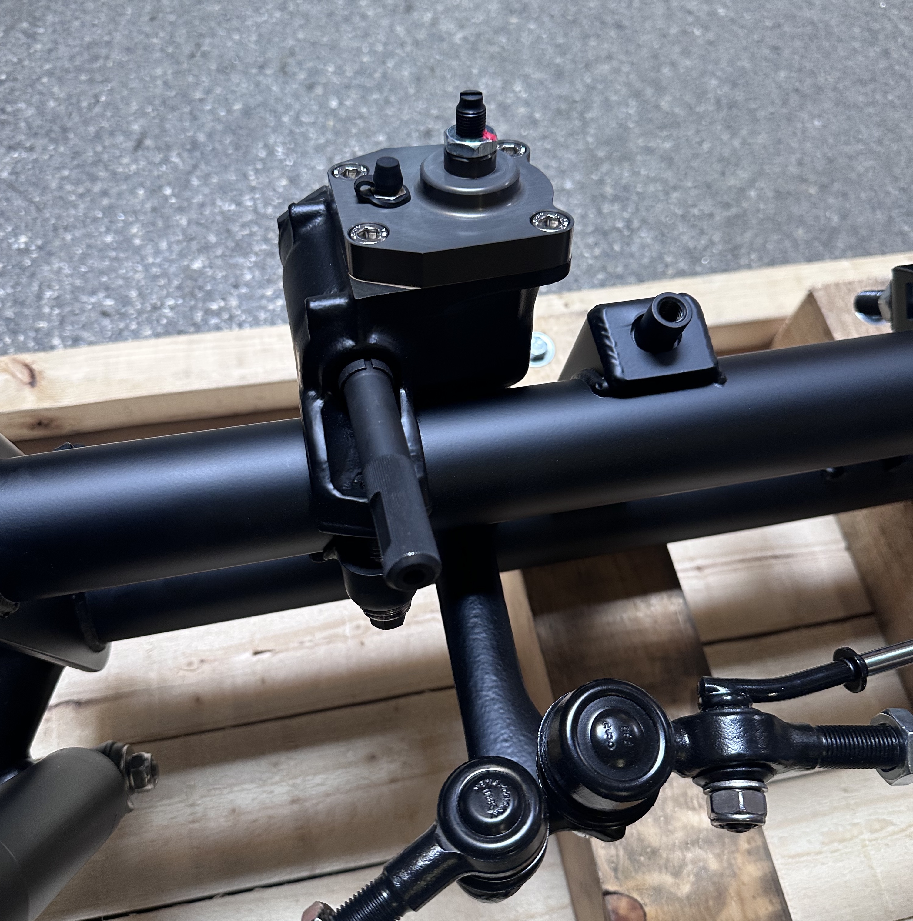 Airkewld ProBuilt steering box detail showing factory ring and grease zerks
