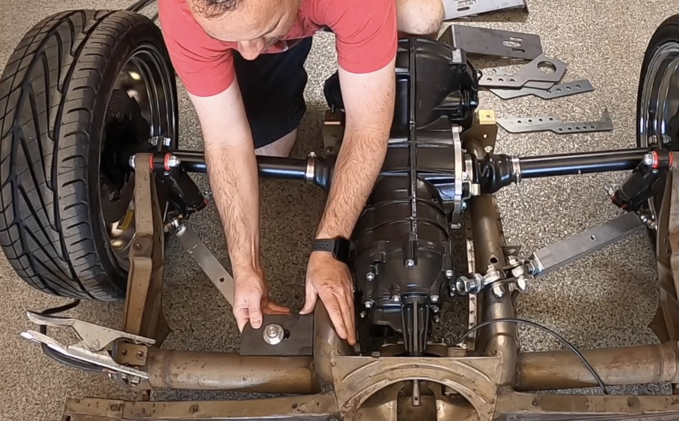 Tack-welding the upper air bag mount to the torsion housing